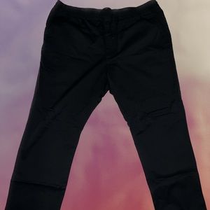 Black Nike Dri-Fit Pants. 4 very deep pockets and one extra side leg pocket.